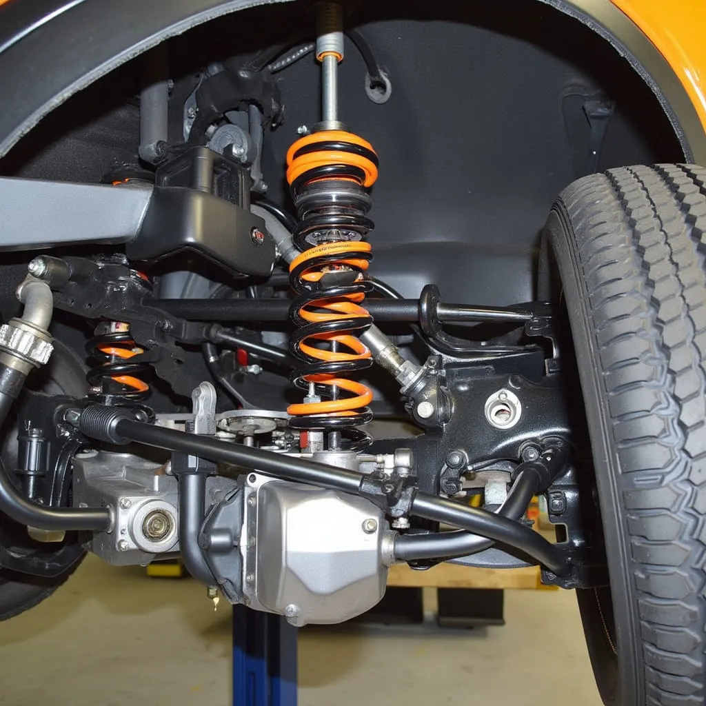 Coil spring suspension system